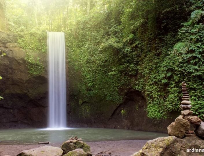 Tibumana Waterfall hidden gem in Ubud surrounded by jungle trees.jpg